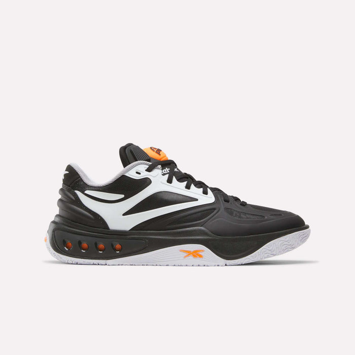 The Reebok Engine A Pump Shoes are black and white athletic sneakers with orange accents, featuring a white sole and multiple ventilation holes along the midsole. Designed for ultimate comfort and agility on the court, these performance basketball shoes incorporate advanced Pump technology for a customizable fit during dynamic play. Shown here on a plain white background.