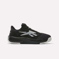 Reebok Engine LT Shoes are black and white low-cut athletic sneakers with a mesh toe, patterned outsole, white side logo and detailing, plus a light gray sole designed for superior grip.