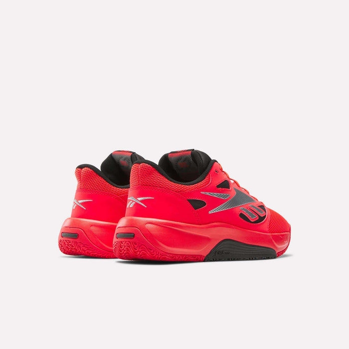 A pair of Reebok Engine LT Shoes in bright red with black and silver accents, displayed from the back and side on a plain white background.