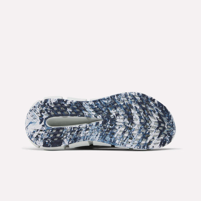 The image shows the sole of Reebok FloatZig 2 Running Shoes with a wavy, textured blue, white, and gray pattern. The varied tread offers grip and traction, while Superfloat+ cushioning ensures enhanced comfort.