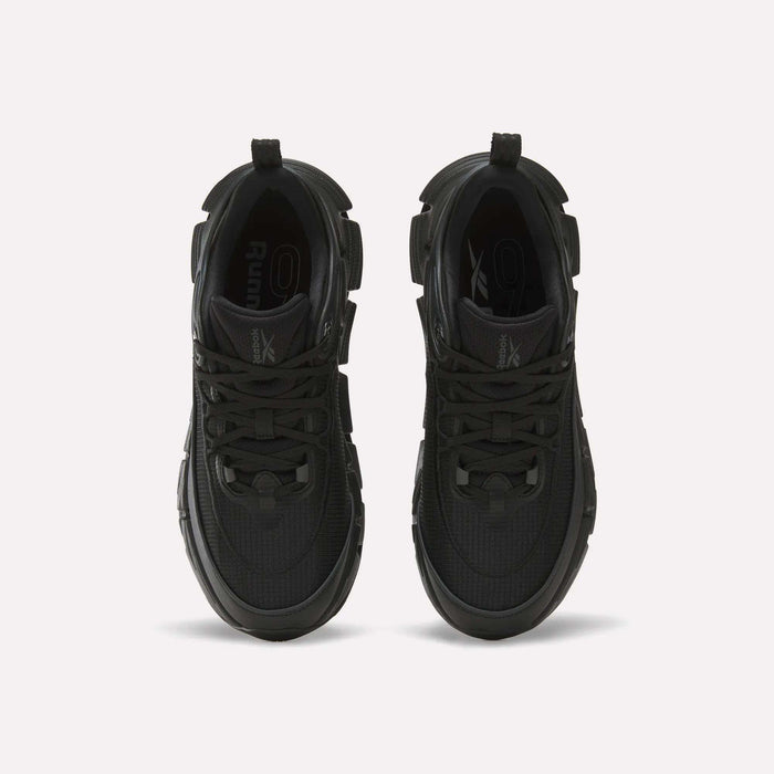 A top view of a pair of Reebok Floatzig Encore Running Shoes in black with laces, displayed against a plain white background. These shoes showcase a textured surface, looped pull tabs on the heels, and feature design elements ideal for walking and fitness activities.