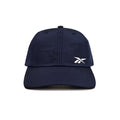 A front view of the Reebok Flow Cap in navy blue, featuring a small white Reebok logo on the left crown and a moisture-wicking sweatband for comfort.