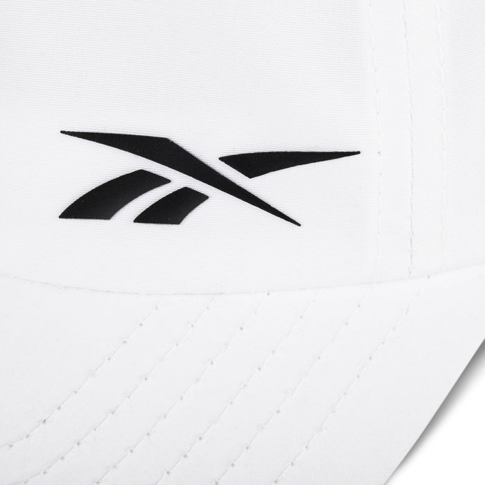 Close-up of the Reebok Flow Cap in white, crafted from recycled polyester with a black Reebok logo on the front, curved brim with visible stitching, and a moisture-wicking sweatband for added comfort.