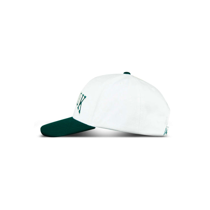 Side view of the Reebok Gameday Cap in white with a dark green brim and button top. Embroidered text appears on the crown, and the cap is displayed against a plain white background.