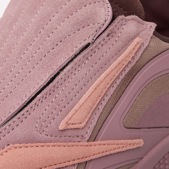 Close-up of the Reebok Hammer Pro LTD Shoes in mauve and pink, highlighting the intricate stitching, textured materials, and layered design details on the suede upper and sides.