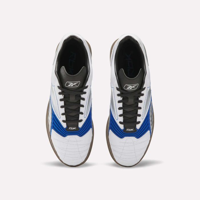 A pair of Reebok Hammer Valde Shoes seen from above, with a white leather upper, blue and black accents, black laces, brown soles, and branding on the tongue and side.