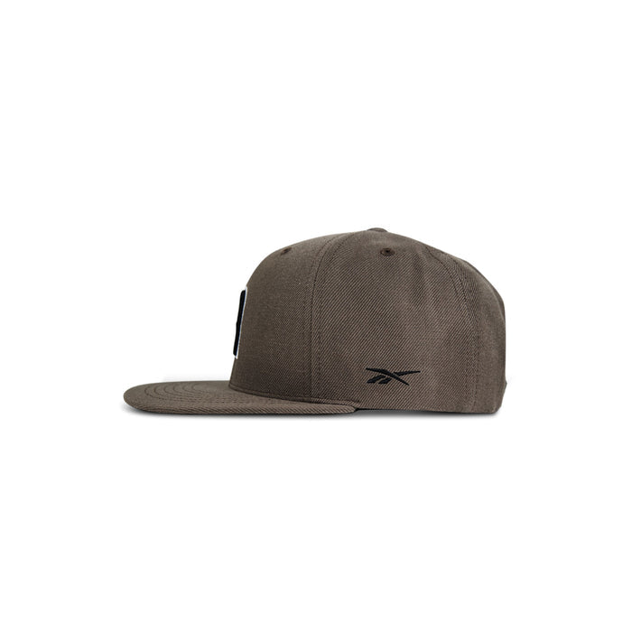 A side view of the Reebok Identity Drop R Cap in brown, showcasing a flat brim, structured crown, small black side Reebok logo, and a classic snapback closure for adjustable fit.