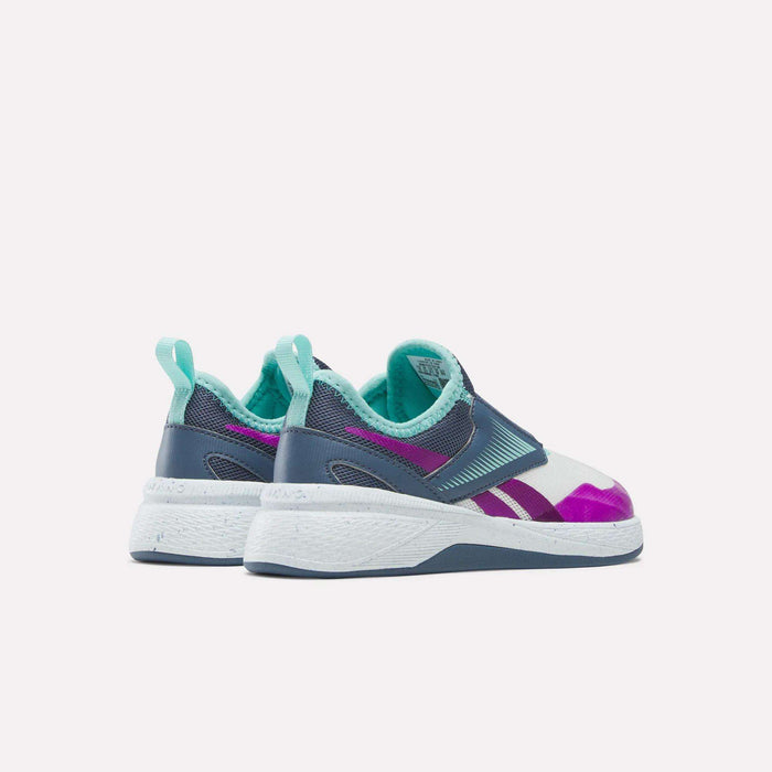 The Reebok Kids' Nano Play Slip-on training shoes for girls are shown from the back and side, displaying blue, teal, purple, and white accents against a plain white background.