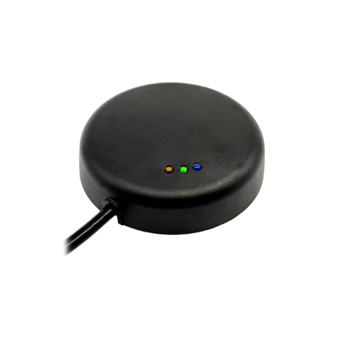 A black circular electronic device with a power cable extending from the side and three small indicator LEDs
