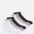 Six pairs of Reebok Kids' Low Cut Basic Socks—two white, two gray, and two black—are arranged in a row on a plain white background. These cushioned socks feature moisture-wicking fabric for comfort.