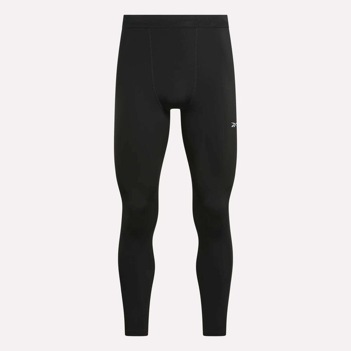 Men’s Athlete Speed Running Tights by Reebok in black, featuring RBK-DRY tech, a fitted design, and a small white logo on the left thigh, shown against a plain light background.