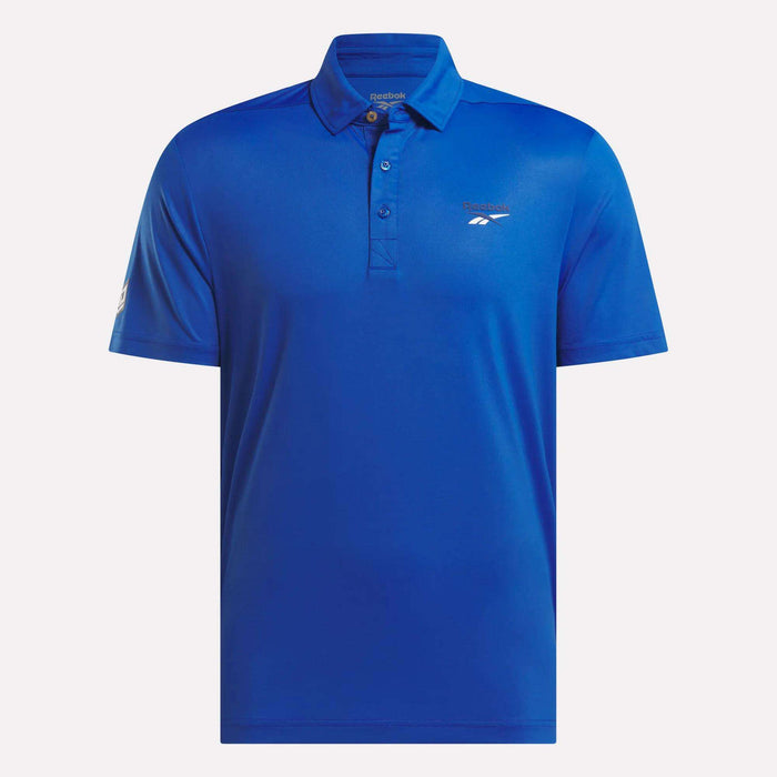 The Reebok Men's BDC Colorblocked Polo Shirt features short sleeves, a collar with three buttons, RBK-DRY tech for comfort, and the Reebok logo on the left chest and sleeve.