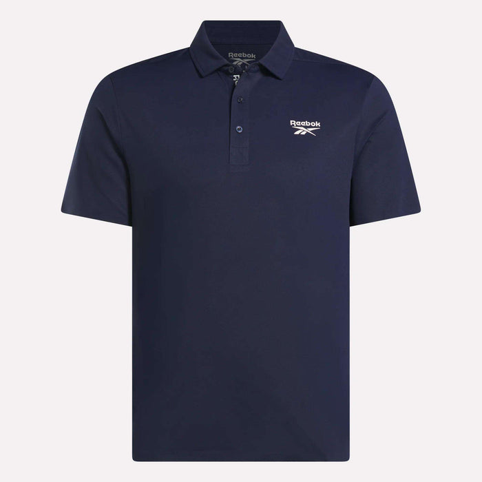 The Reebok Men's Bonded Pique Polo Shirt in navy features short sleeves, a collar, a three-button placket, UPF protection, and a white embroidered Reebok logo on the left chest.