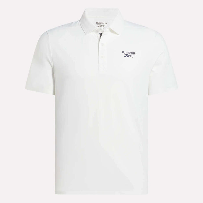 The Reebok Men's Bonded Pique Polo Shirt is plain white with short sleeves, a collar, and three buttons. A black Reebok logo appears on the left chest. The background is light gray.