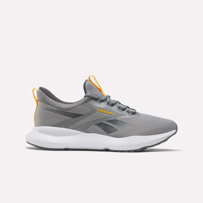 The Reebok Men's Cityride 2 Running Shoes in Grey/Orange feature FuelFoam cushioning, a white sole, orange accents on the heel and tongue pull tabs, and the Reebok logo in orange on the side. Seen from the side against a plain light background.