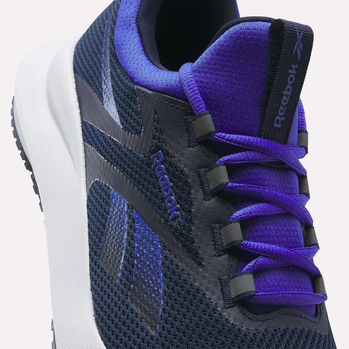 Close-up of Reebok Men's Cityride 2 Running Shoes in dark blue and black with purple accents, purple laces, and a white FuelFoam-cushioned sole. The Reebok logo appears on the side and tongue.