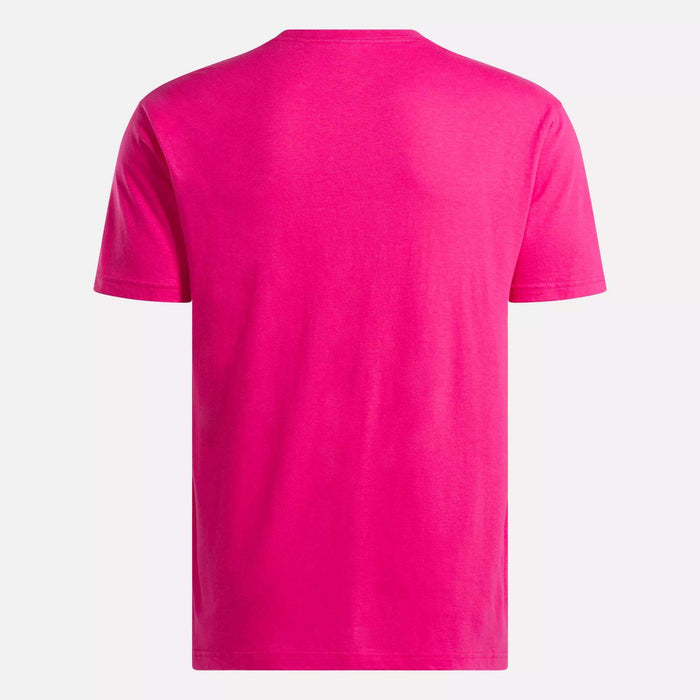 The Men's Classic Small Logo T-Shirt by Reebok in plain bright pink is made from soft cotton and shown from the back against a white background.