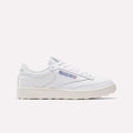 The Men's Club C Golf Shoes by Reebok are white, low-top sneakers with the Reebok logo and Union Jack on the side, water-resistant leather, white laces, and a textured off-white spikeless outsole, shown against a plain light background.