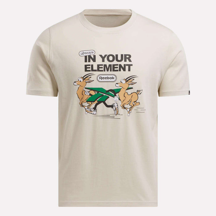 The Men's Club Graphic T-Shirt by Reebok is a 100% cotton beige tee featuring cartoon antelopes in sneakers running together, with "always IN YOUR ELEMENT" and the Reebok logo printed above them.