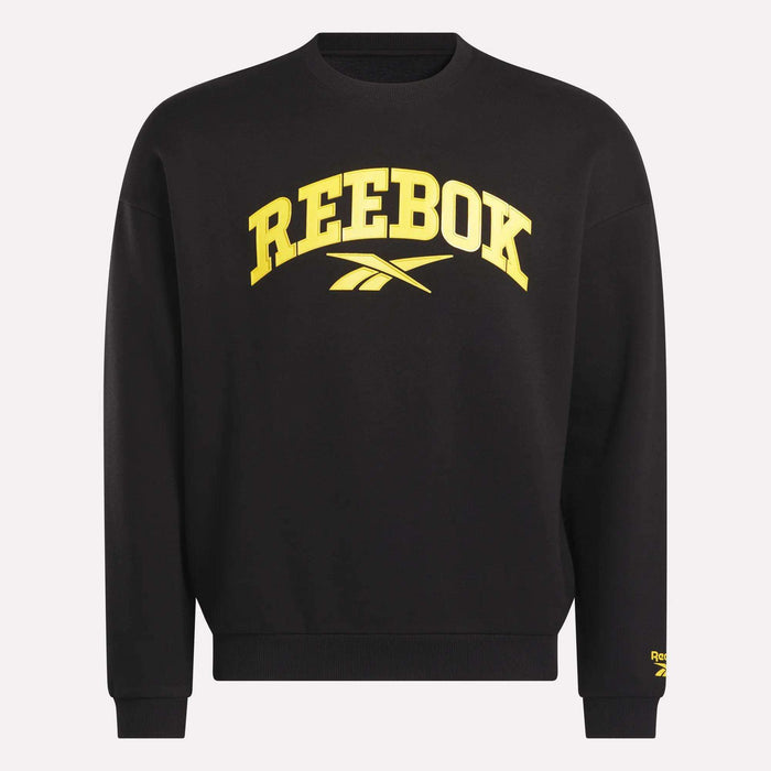 The Reebok Men's Cottle Sweatshirt is black with bold yellow "REEBOK" lettering and logo on the front, plus a small yellow Reebok logo on the lower left sleeve.