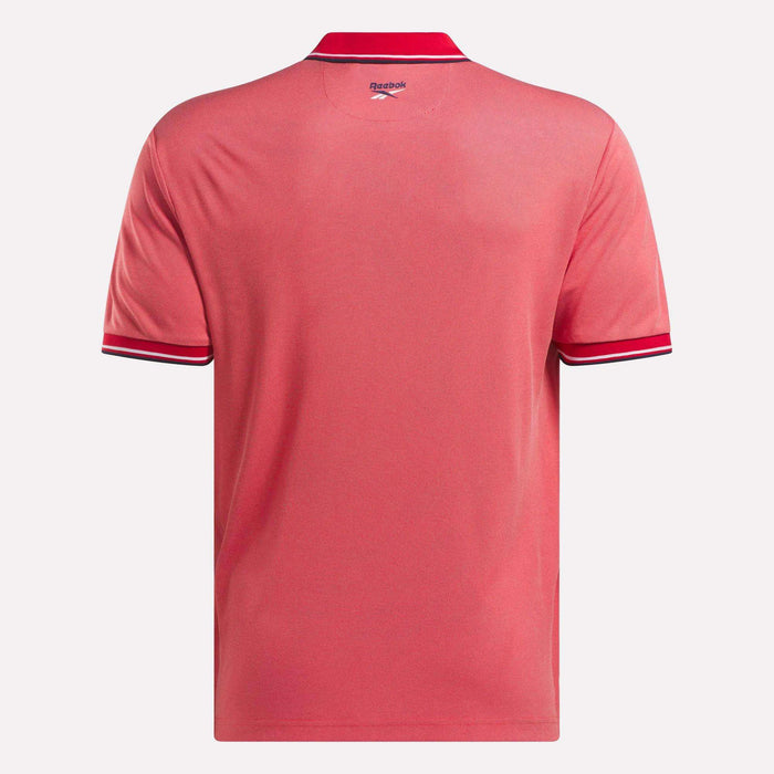 The Men's Country Club Oxford Pique Polo Shirt by Reebok boasts a sleek logo and is ideal for casual outings or the golf course.