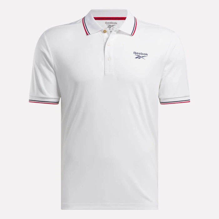 The Reebok Men's Country Club Oxford Pique Polo Shirt features short sleeves, a three-button placket, red and navy trim on the collar and sleeves, plus the Reebok logo on the left chest for classic golf style.