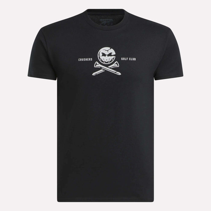 The Men’s Crushers Tee by Reebok features a bold white skull-like logo with crossed golf clubs and “CRUSHERS GOLF CLUB” text centered on the chest, inspired by Bryson DeChambeau.