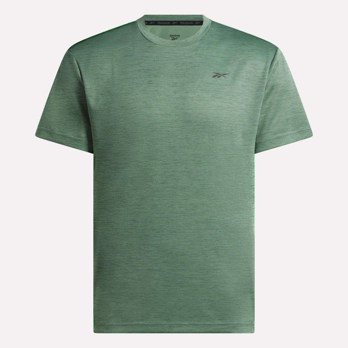The Reebok Men's Director Short Sleeve Top is a plain, heathered green training tee with short sleeves, a crew neck, and a small Reebok logo on the left chest.