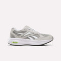 Experience versatile comfort with the Reebok Men’s DMX Comfort+ Walk Ultra Shoes in Aha - New Grey 2/White. Designed for all-day support, these athletic sneakers feature breathable mesh and suede panels paired with classic white laces. The white sole is highlighted by black and white midsole accents, while a green DMX logo details the heel. Engineered with DMX Comfort+ technology, they deliver outstanding cushioning for your daily walks.