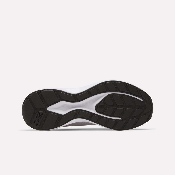 The image shows the bottom view of the Reebok Men's Energen Run 4 Running Shoes, featuring a black rubber outsole with patterned tread, a white FuelFoam midsole, and the Reebok logo visible on the heel.