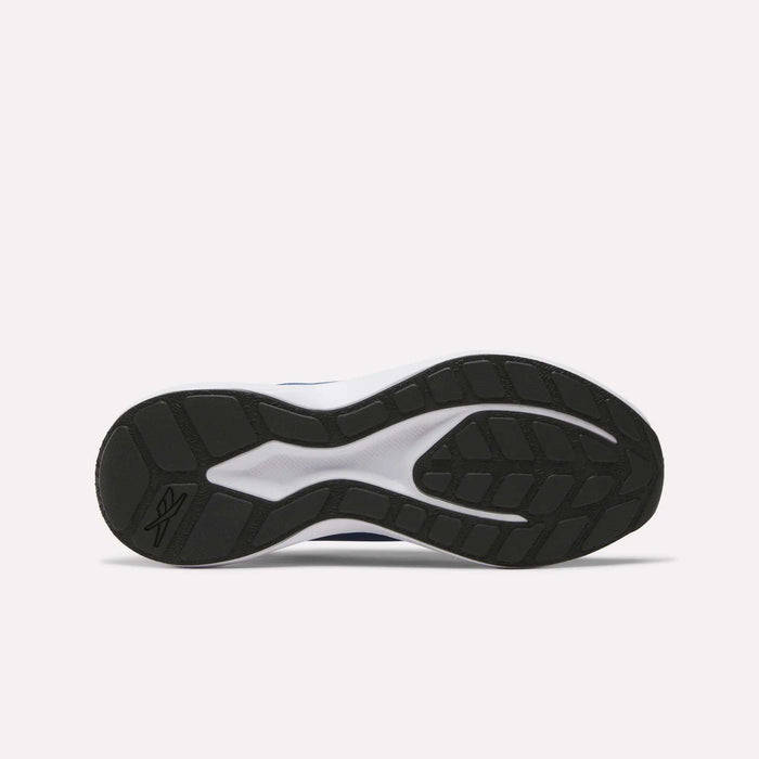 The image shows the black rubber outsole of Reebok Men's Energen Run 4 Running Shoes, featuring a patterned tread and white FuelFoam midsole accents. The lightweight shoe is displayed sole-up against a plain white background.