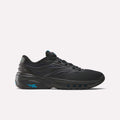 The Men's ERS Training Shoes by Reebok feature a black mesh upper, black laces, a thick black sole with blue accents, and a blue Reebok logo on the heel. Enjoy premium cushioning for all your training needs.