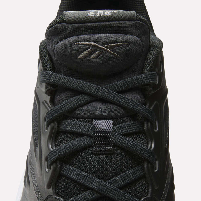 Close-up of Reebok Men's ERS Training Shoes in black, featuring laces, mesh fabric, sleek overlays, padded tongue with Reebok logo, visible stitching, and premium cushioning for comfort.