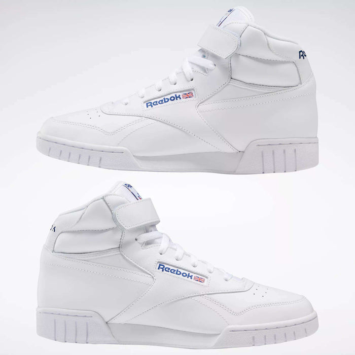 The Reebok Men's EX-O-FIT Hi Shoes are white leather high-tops with blue and red logos, strap closures at the ankle, and a clean retro design. Two shoes are shown side by side on a plain light background.