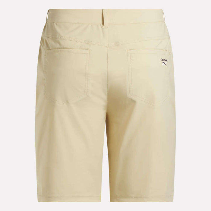 Back view of Reebok Men's Favorite 5-Pocket Golf Shorts 9" in beige, with two rear pockets and a small logo above the right one. Sweat-wicking fabric keeps you cool on the course.