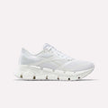 The Reebok Men's FloatZig 2 Running Shoes feature a white mesh upper, detailed side panels, and a thick sculpted sole with energy-returning cushioning, shown against a plain white background.