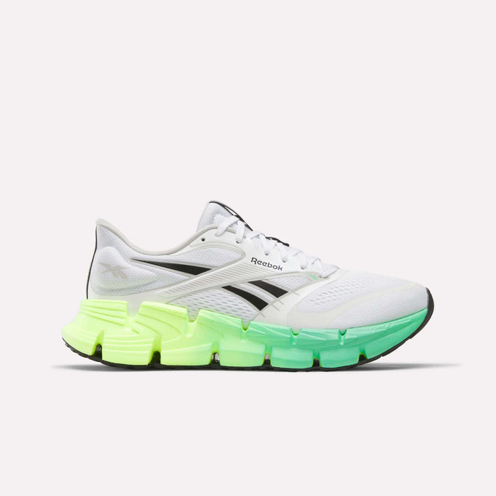 The Reebok Men's FloatZig 2 Running Shoes in White/Digital Lime/Black feature black accents, a chunky sole fading from neon yellow to green, and advanced Superfloat+ cushioning for superior comfort. Displayed on a white background.