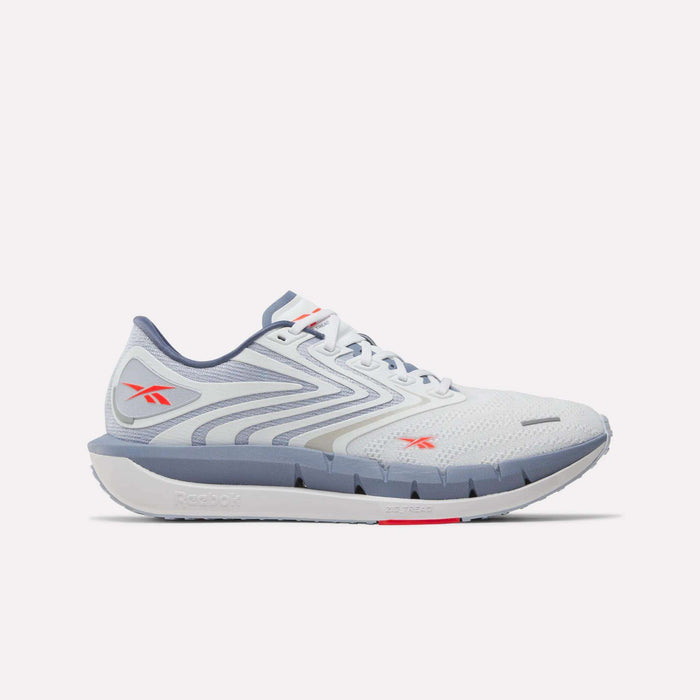 Side view of a white and light gray Reebok Men's FloatZig Tread Running Shoe with blue-gray sole and red logos. Mesh upper, cushioned midsole, and sleek design make it ideal for treadmill workouts or daily runs.