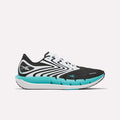 The Reebok Men's FloatZig Tread Running Shoes feature a black and white design with teal accents and a thick cushioned midsole, ideal for treadmill workouts, shown in a side profile on a plain white background.