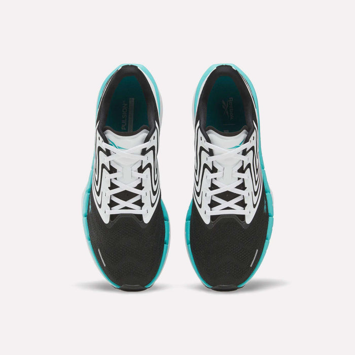 A pair of black Reebok Men's FloatZig Tread Running Shoes with white and teal accents, seen from above, highlights laces and a cushioned midsole—ideal for treadmill workouts against a plain white background.