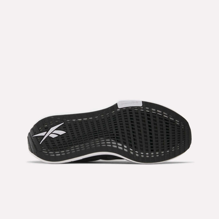 The Reebok Men's FloatZig Tread Running Shoes feature a black athletic sole with a white logo and grid-like tread pattern, perfect for treadmill workouts, displayed on a plain white background.