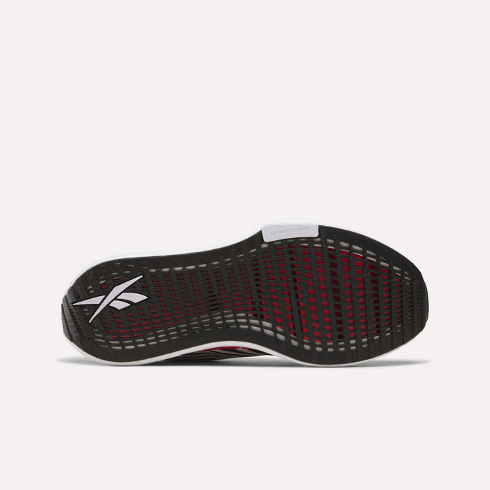 The image shows the sole of a black Reebok Men's FloatZig Tread Running Shoe with a white logo on the heel, red midsole accents visible through its grid-like tread—designed for optimal treadmill performance.