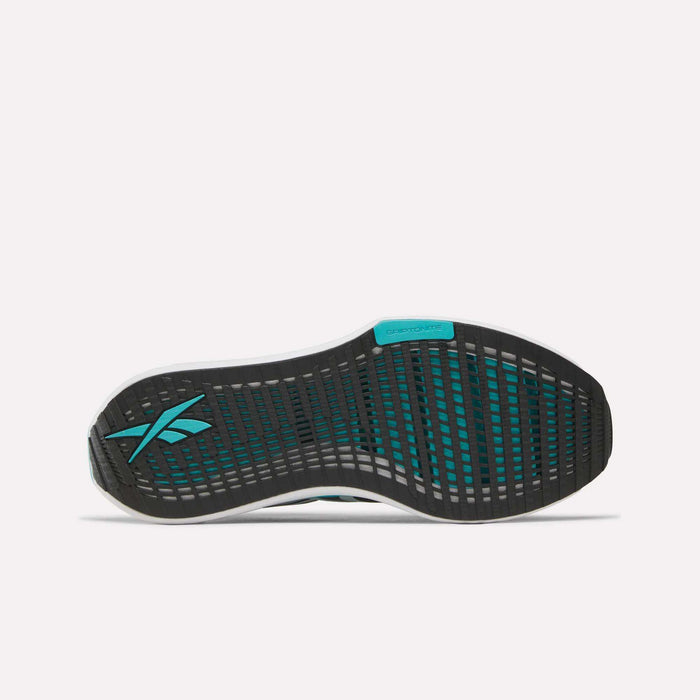 The image shows the sole of the Reebok Men's FloatZig Tread Running Shoes, featuring a black and teal tread pattern with a Reebok logo on the heel and a turquoise DELTAPEAK section—ideal for treadmill use.