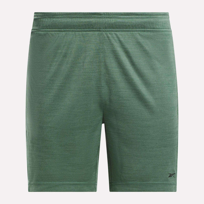 Reebok Men's Inclination Shorts in green with a subtle texture, elastic waistband, and small black logo by the left hem. These performance shorts are shown on a plain white background.