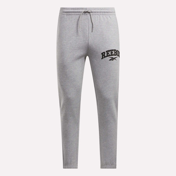 Reebok Men's Joggers in light gray, crafted from soft fleece with an elastic waistband, drawstring, and tapered legs. The left thigh features a black Reebok logo and vector symbol. Shown on a plain white background.
