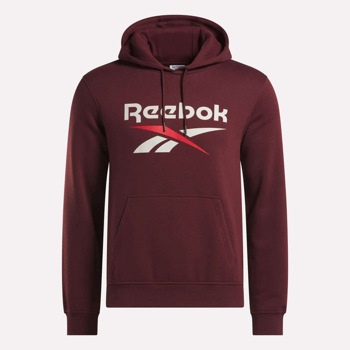 The Men's Logo Hoodie by Reebok is a maroon pullover for men with a front kangaroo pocket, drawstring hood, and bold white and red Reebok logo on the chest, crafted from soft cotton-blend fleece for comfort.
