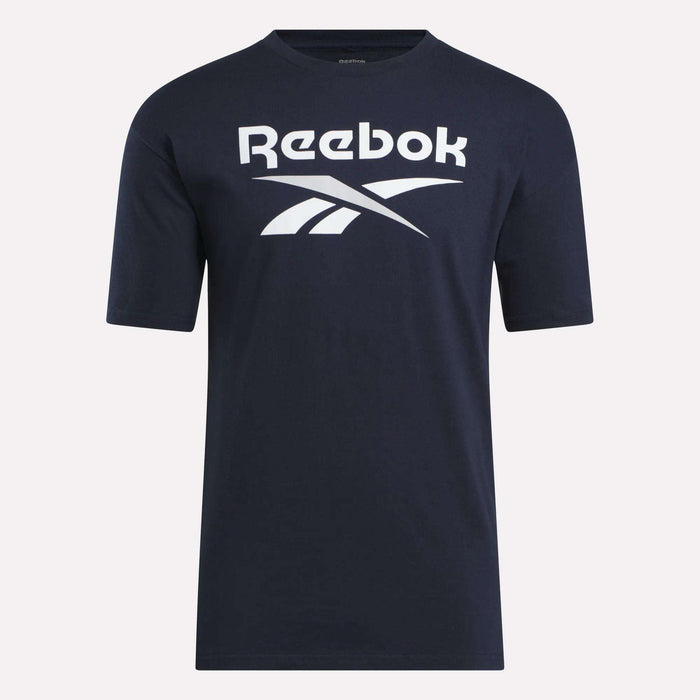 The Reebok Men's Stacked Vector T-Shirt is a navy blue cotton tee with short sleeves, featuring a bold white Reebok logo and text on the chest—ideal for everyday comfort.