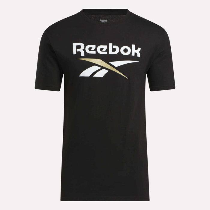 The Men's Stacked Vector T-Shirt by Reebok is a black short-sleeve tee with the white and gold Reebok logo on the chest, crafted from soft cotton and shown on a plain light background.