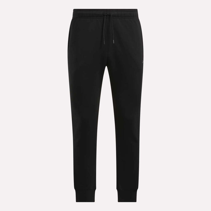 Reebok Men's Motion Joggers in black, featuring a slim fit, elastic waistband with drawstring tie, side pockets, and fitted cuffs, displayed on a plain white background.