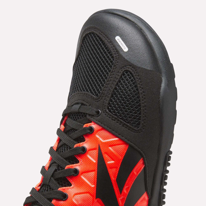 Close-up of the toe and laces on Reebok Men's Nano 2.0 Training Shoes in red and black, with mesh and synthetic materials, a textured sole, and layered design—ideal for functional fitness workouts.